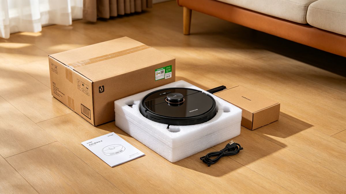 Unboxing a refurbished robot vacuum with certified label on the box